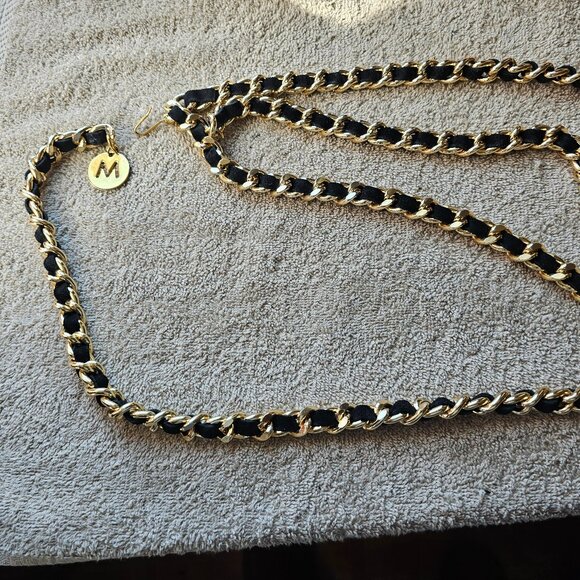 Womens gold and black body belt over 30 inch